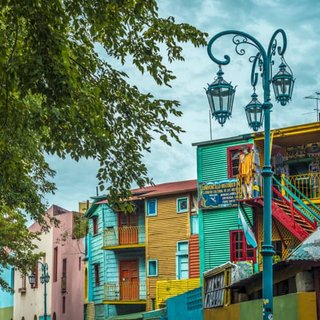 Brightly painted houses in La Boca, Buenos Aires, on a family-friendly live tour